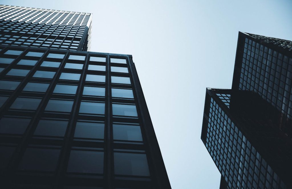 Stunning low-angle shot of New York City's modern skyscrapers against a clear sky.